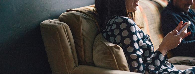 Woman sitting on the couch